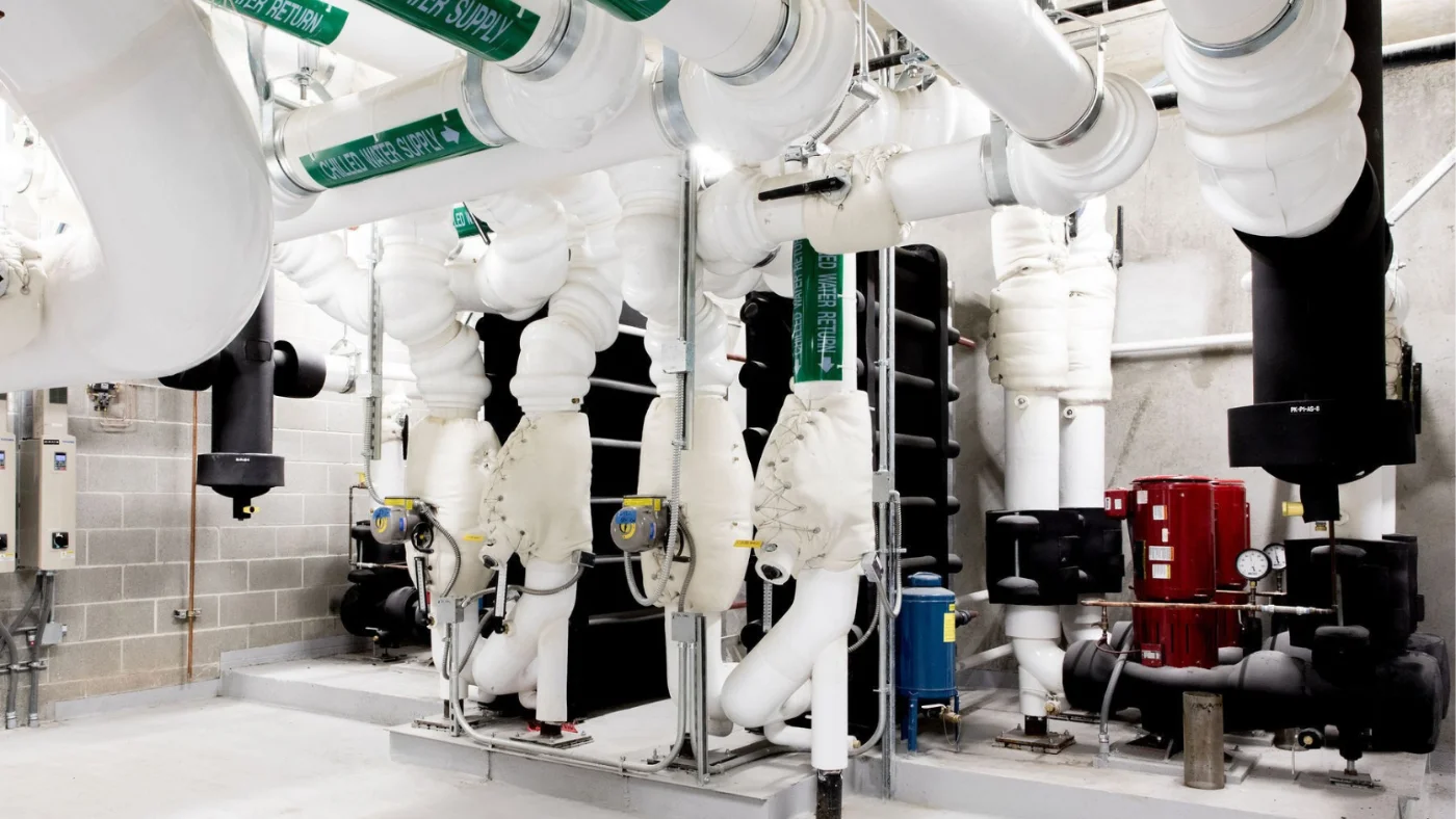 District energy plant room — chilled-water piping