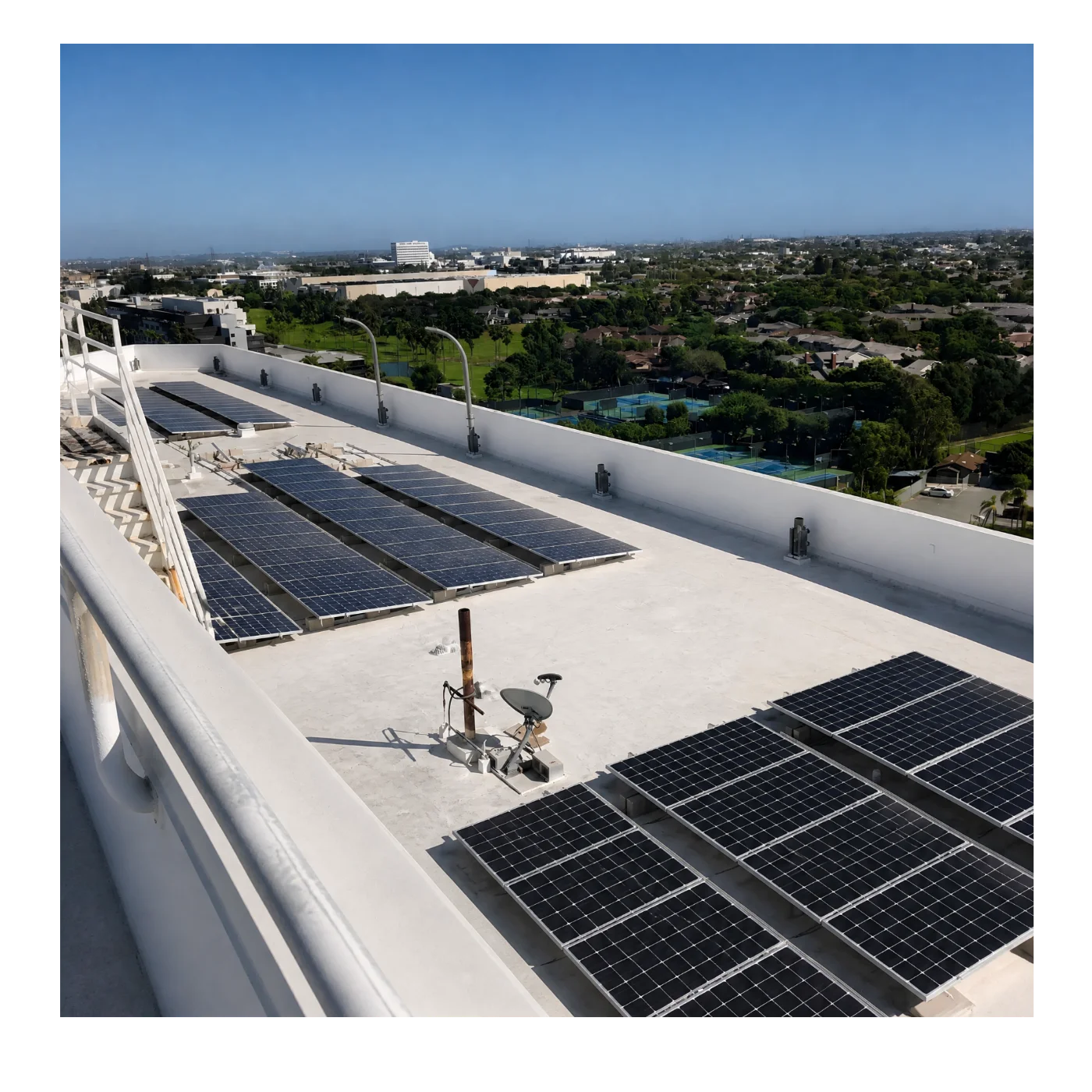 Aerial view of rooftop solar PV arrays